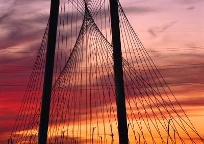 1340 Margaret Hunt Hill Bridge by Santiago Calatrava, dramatic dusk light, arch, cables & power lines detail, Dallas, TX (horizontal)