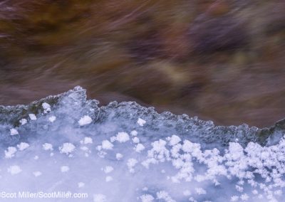 07577 Ice and frost, rushing water on the Swift River after a winter blizzard, White Mountains of New Hampshire