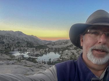 Scot Miller headshot in Sierra Nevada