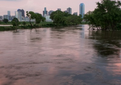 1100500 Trinity River flooding, downtown Dallas, Texas, dusk