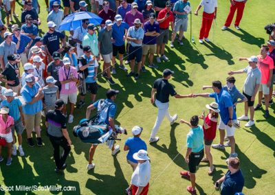 02474 Jordan Spieth fist-bumping fans during the 2018 AT&T Byron Nelson tournament at Trinity Forest Golf Club, Dallas, TX